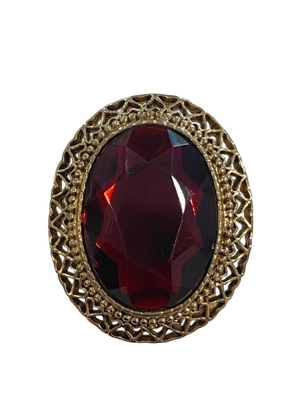 Vintage Gold-Tone Oval Brooch With Red Faceted Stone And Filigree Detailing